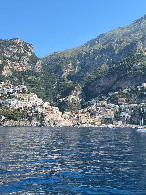 Morning boat views capture Amalfi Coast town Arienzo from sea