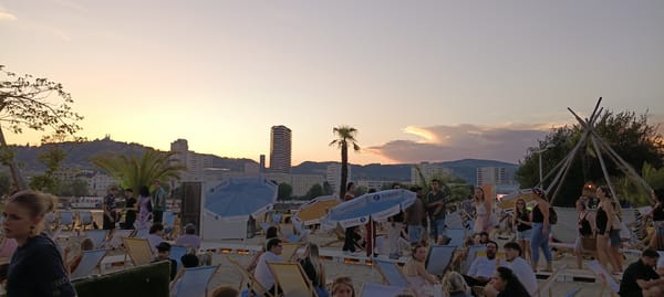 Sunset hangout along the Danube in Linz, summer evening