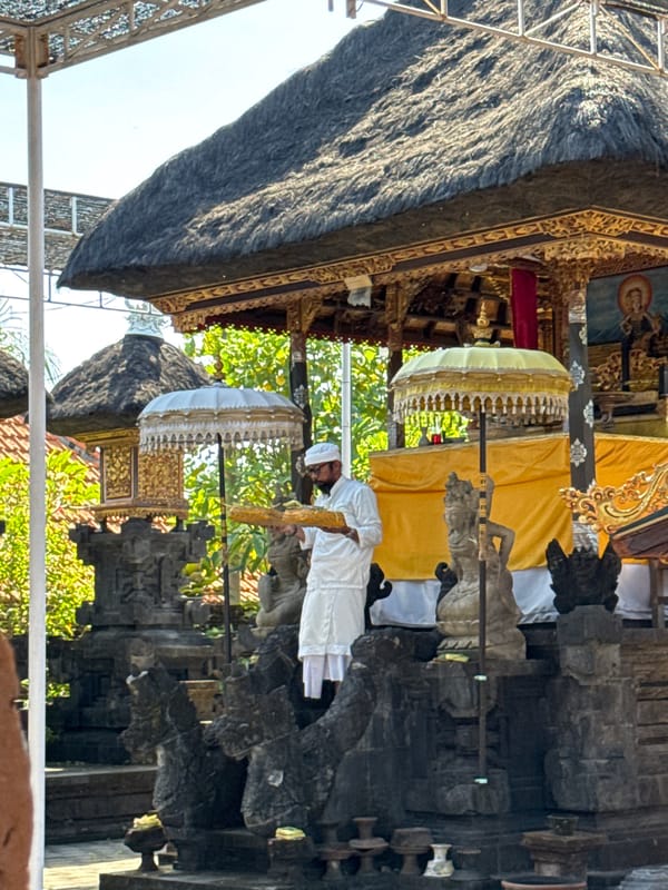 Early morning Hindu ceremony observed at Balinese temple complex
