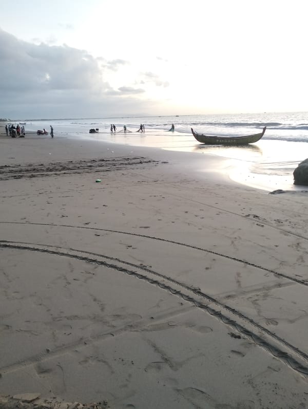 Fishing boats and sunset light on an Acehnese beach