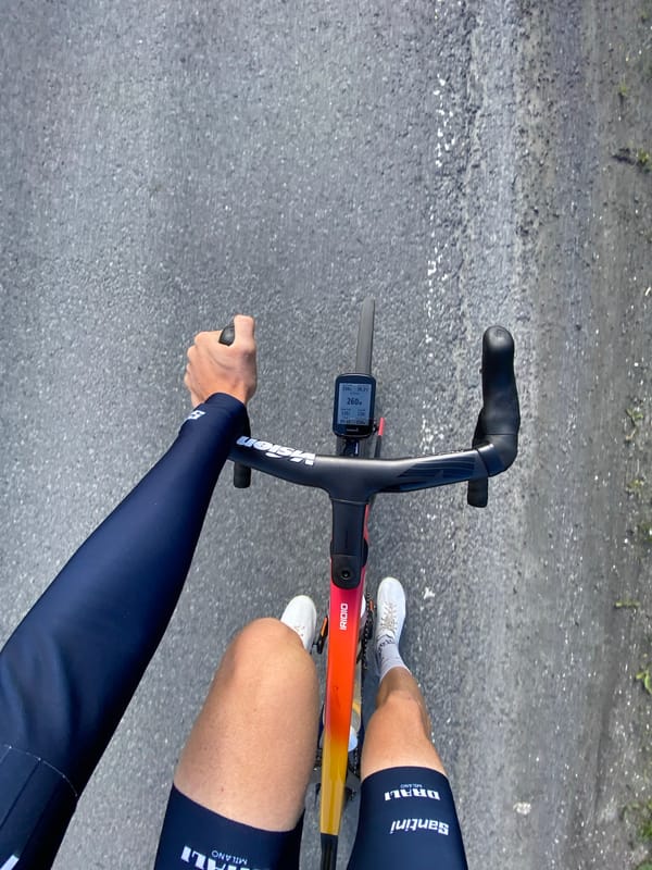 Cyclist rides triathlon bike in Bærums Verk, Norway