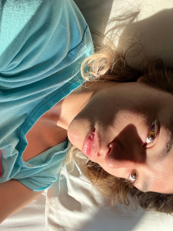 Woman takes selfies on bed in Mexican town