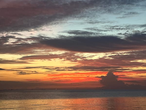 Warm sunset clouds over the Ko Samui coastline