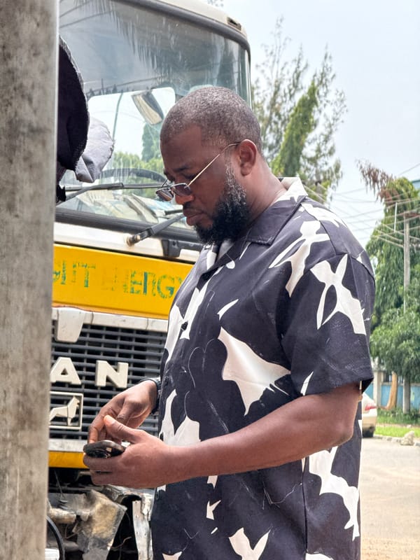 Abuja street vendors and pedestrians on a busy morning
