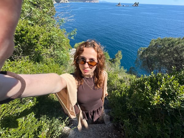 Tourists enjoy scenic clifftop views along Montenegro's Adriatic coast