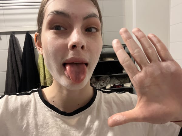 Young woman documents morning skincare routine in Saint Petersburg selfies