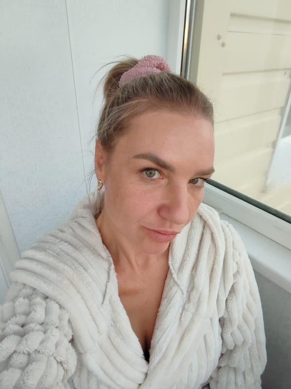 Woman's morning routine captured in Petropavlovsk-Kamchatsky overlooking mountains