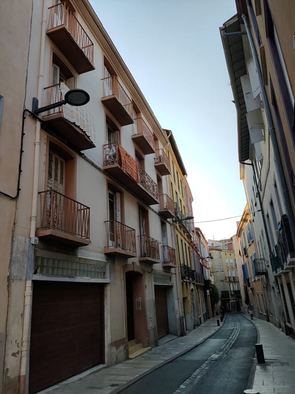 Street-level exploration through Perpignan's historic old town