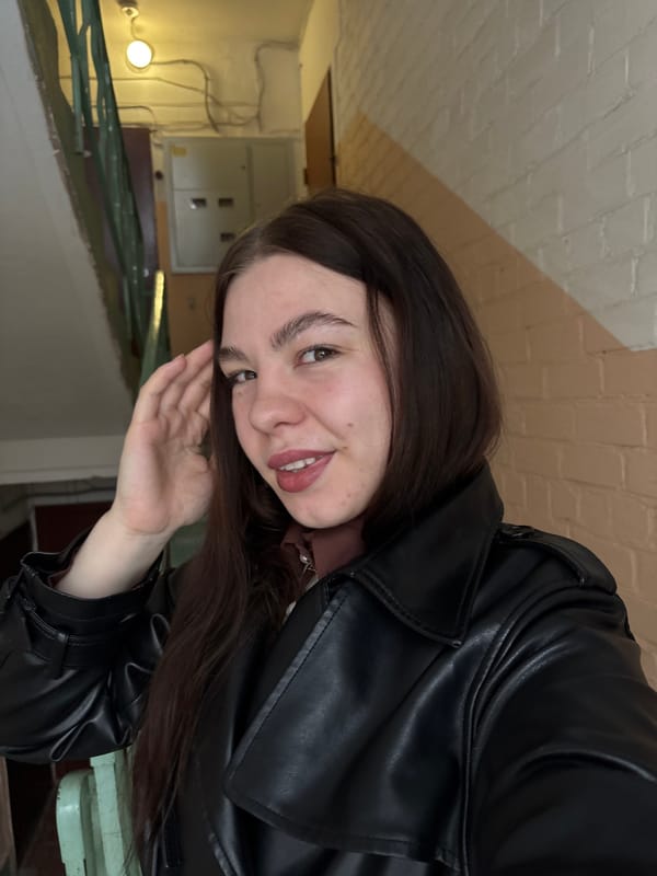 Woman in leather jacket photographed inside building in Perm