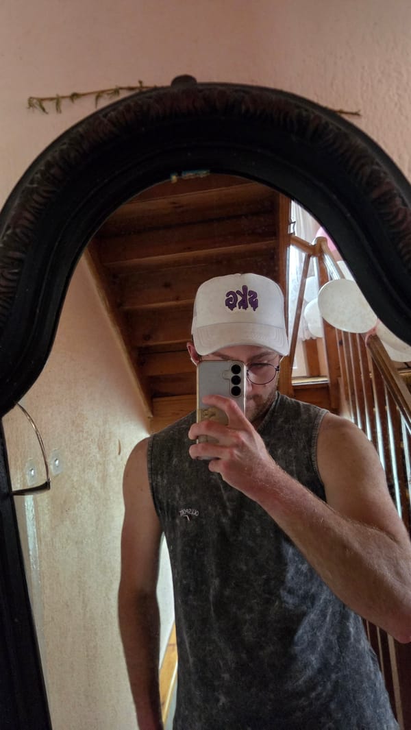 Young man takes selfies indoors in Bania, Bulgaria