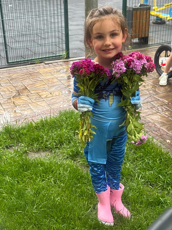 Young girl in blue costume photographed at Ukraine park