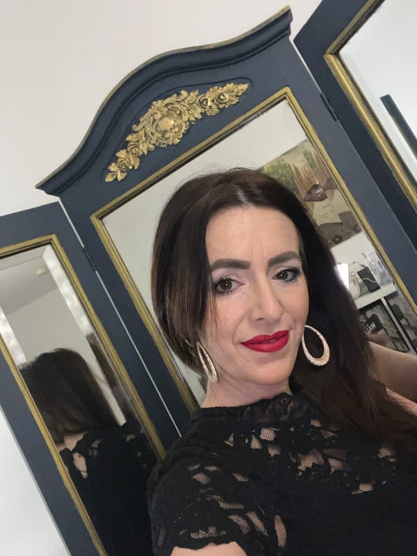 Woman takes mirror selfies in Konz, Germany early morning