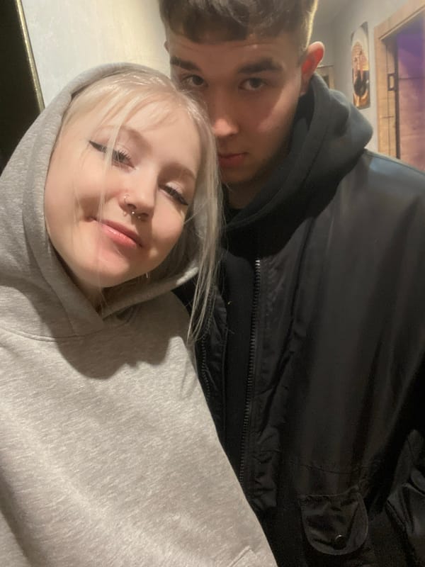 Young adults photographed in casual indoor setting in Izhevsk