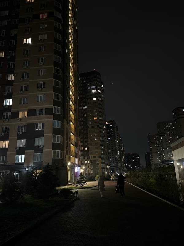 Nighttime residential scene in Rostov-on-Don shows illuminated apartments