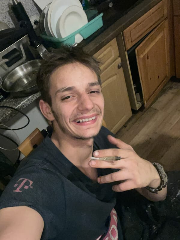 Hanging indoors: smokes, selfies, and a homemade pizza