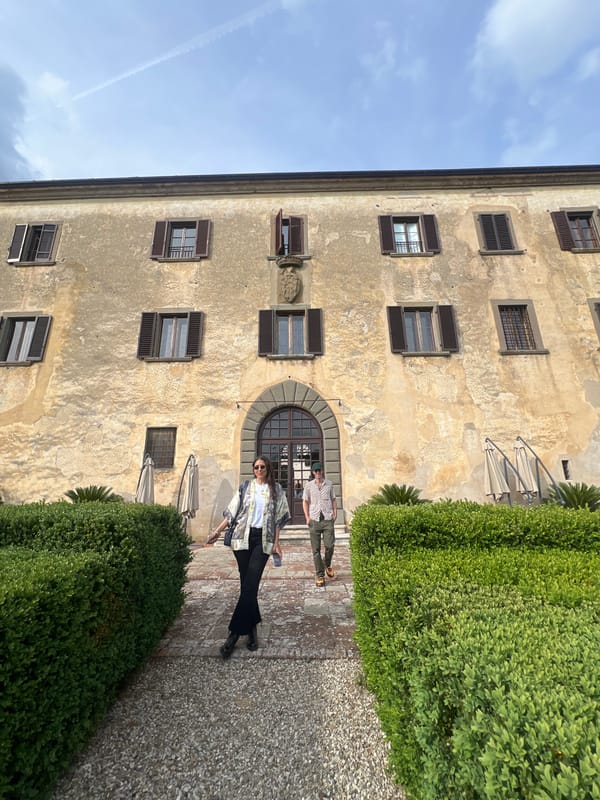 Horseback rider with dog spotted in historic Lucignano, Italy