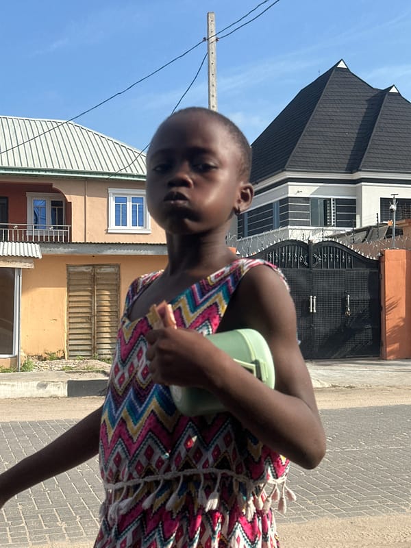 Everyday street life in Badagry on a sunny afternoon