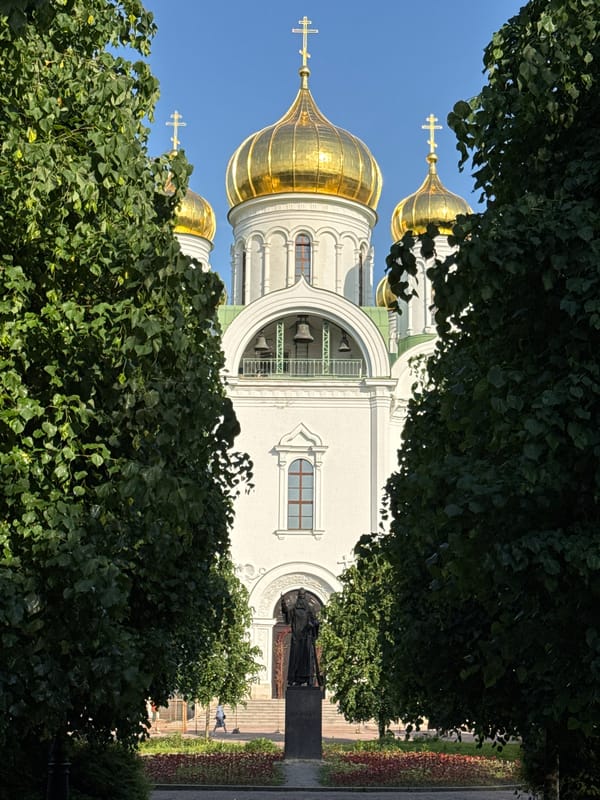 Tourist photographs historic palaces and cathedrals in Pushkin, Russia