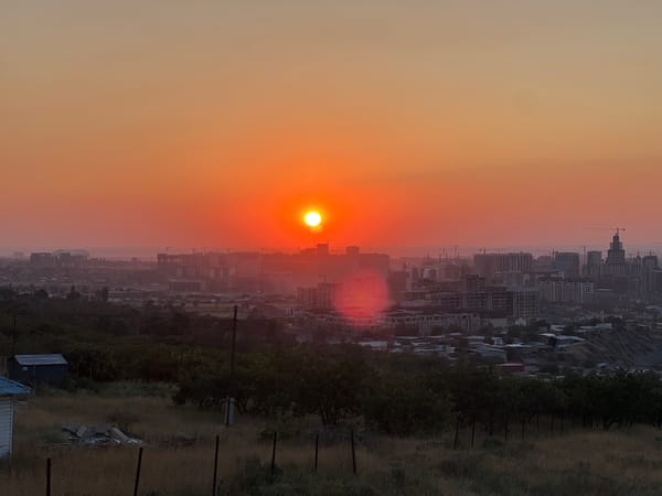 Sunset over Bishkek, golden domes and open sky