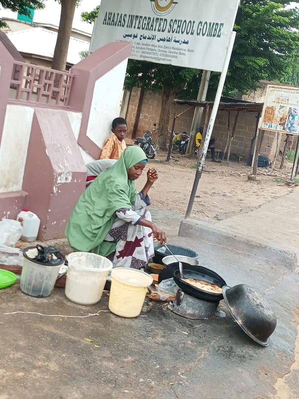 Morning street life in Pantame, Nigeria — people, traffic, routines