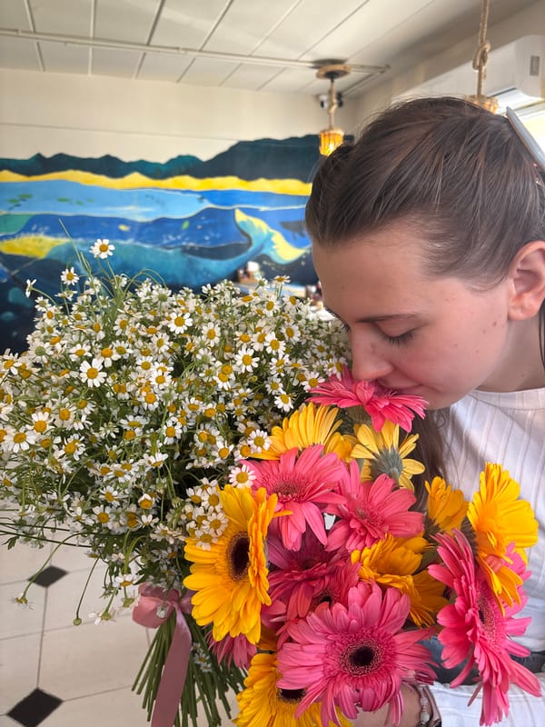 Woman with flower bouquets documented in early morning Phuket