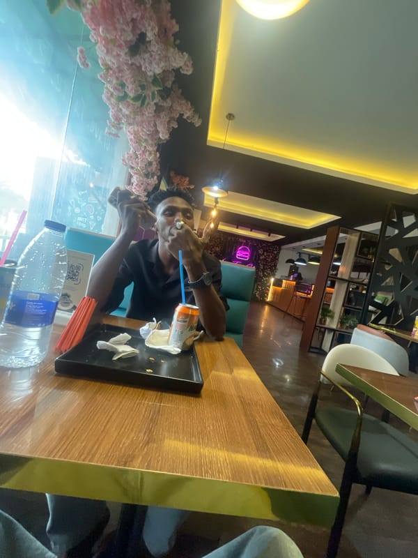 Man documents lunch at Nigerian cafe with selfies