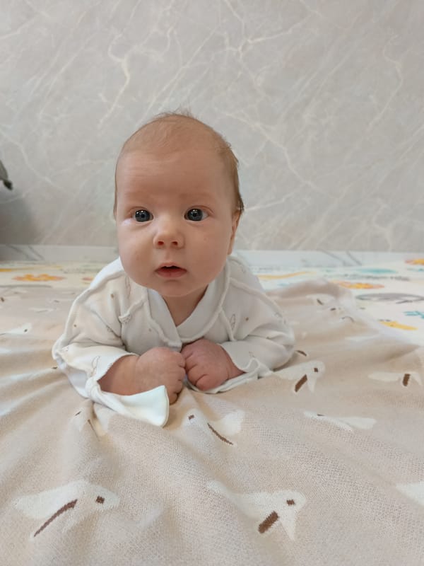 Mother and baby at home in Andreyevo, Russia