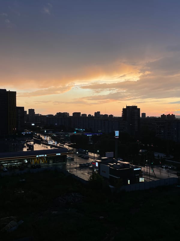 Krasnoyarsk skyline glows at twilight from above