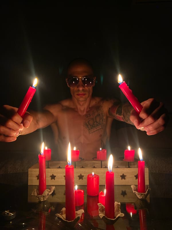 Candlelit gathering with tattoos and sunglasses in Pleven