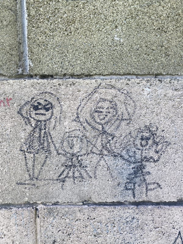 Chalk drawings and park details in a Kamianske neighborhood
