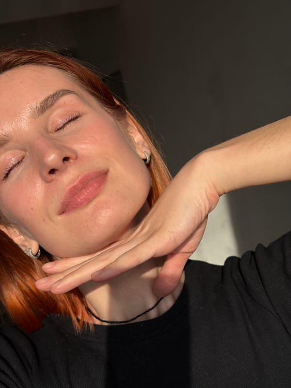 Woman photographed in artistic poses indoors in Chaikovsky