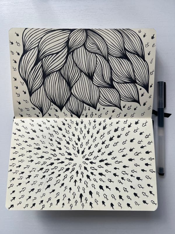 Artist's sketchbook with flower and fish drawings observed in Yessentuki