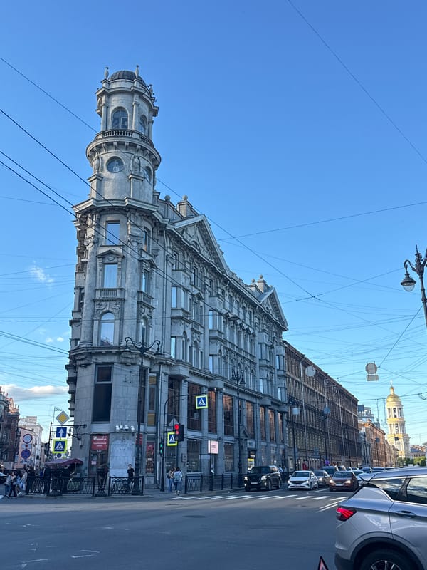 Saint Petersburg bar scene with motorcycles and classic city streetscape