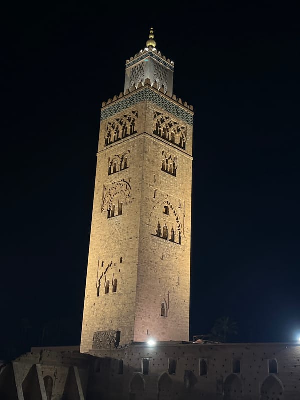 Koutoubia Mosque minaret illuminated at night in Marrakesh