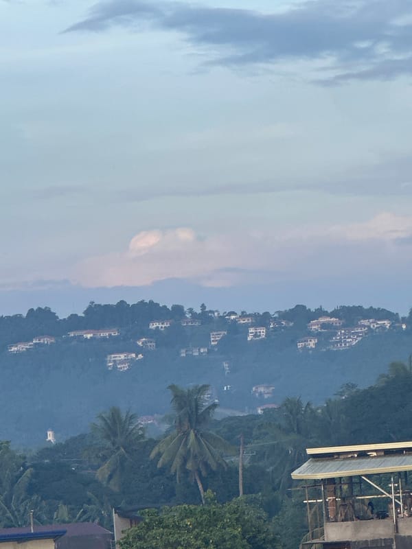 Observer documents Davao City evening views from elevated balcony