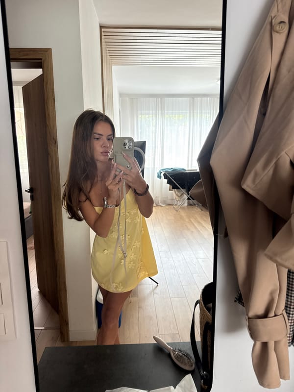 Yellow floral dress selfies and a parked Fiat on Plovdiv cobblestones