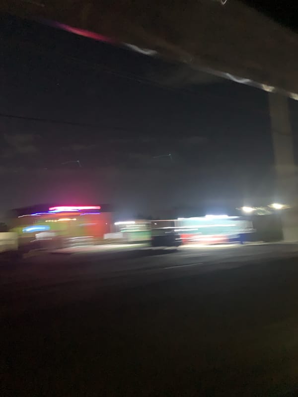 Blurred nighttime city lights captured in Dar es Salaam