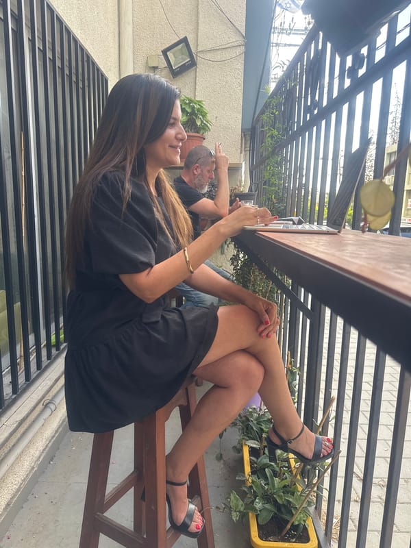 Chilling on a Tel Aviv cafe balcony