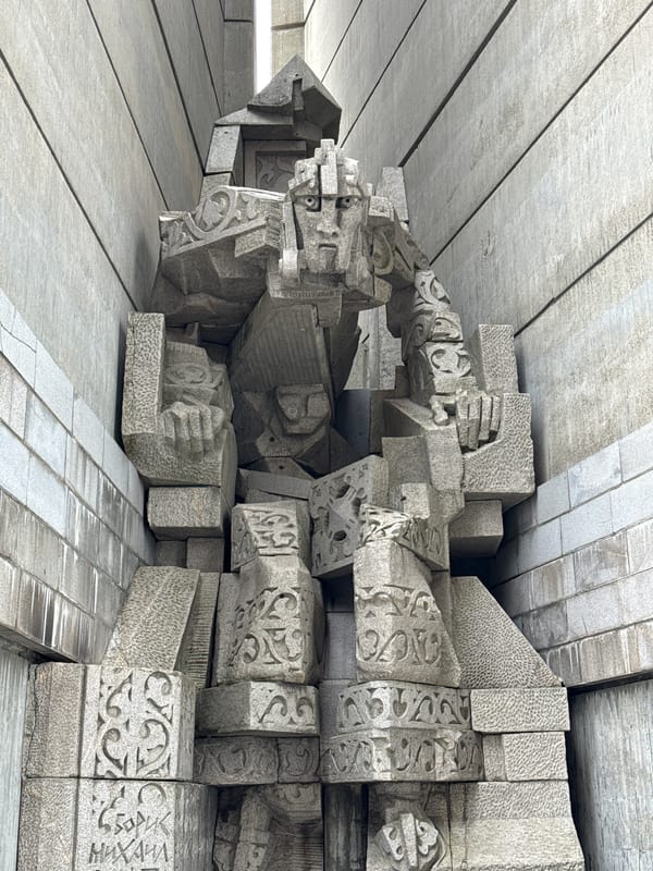 Tourist performs acrobatic jumps at Bulgarian monument in Shumen