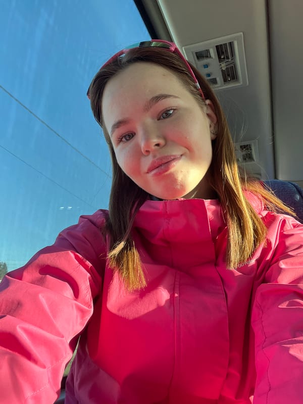 Woman takes selfie in vehicle in Usolye, Russia