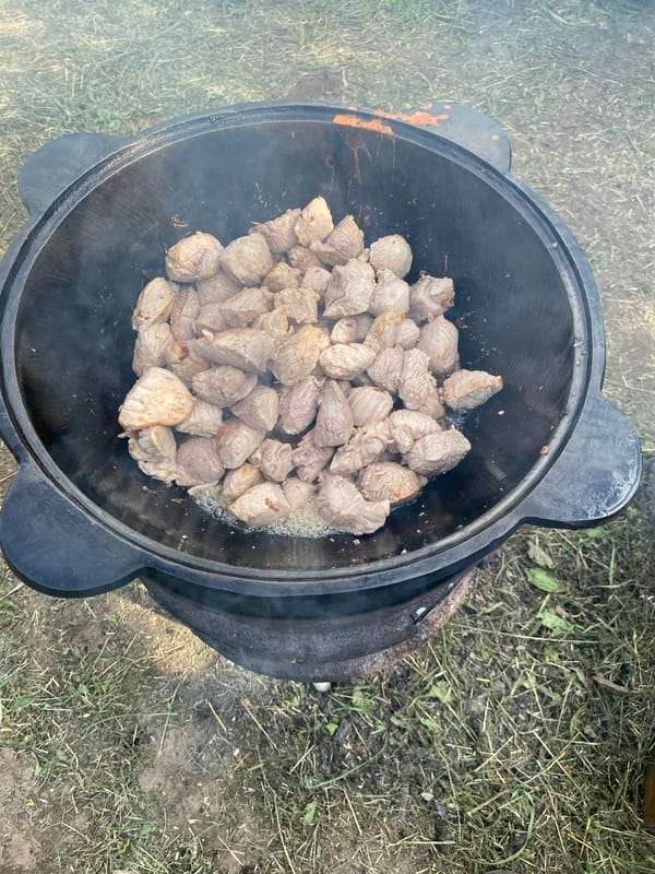 Backyard cauldron cooking over open fire in Kemul, Russia