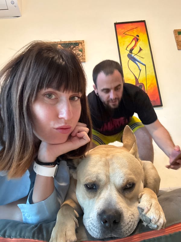 Couple enjoys quiet evening with dog at Aprilia home