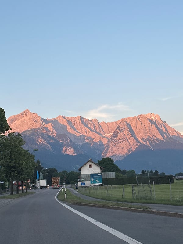 Zugspitze range glows at sunset from Garmisch-Partenkirchen road