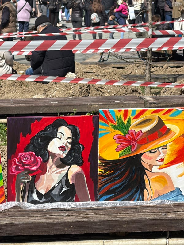 Outdoor art display featuring women portraits spotted in Pazardzhik