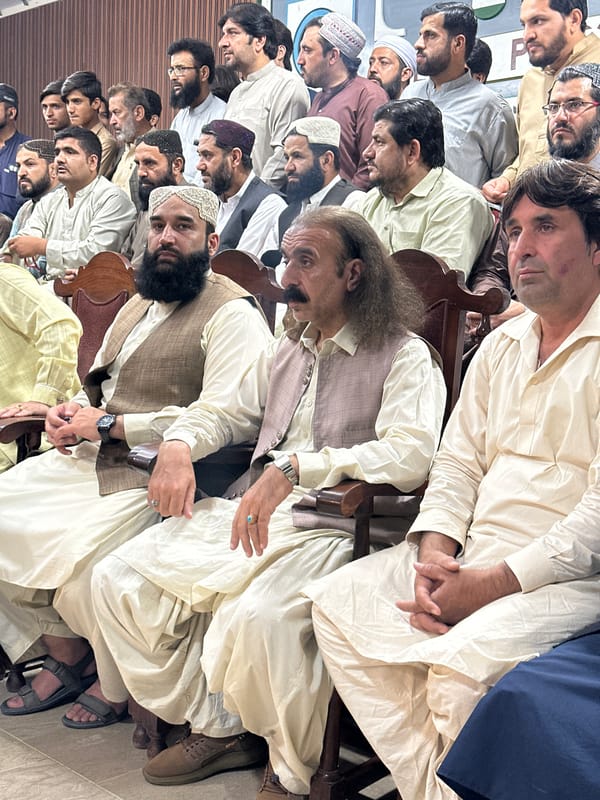 Traditional gathering of men documented in Quetta, Pakistan