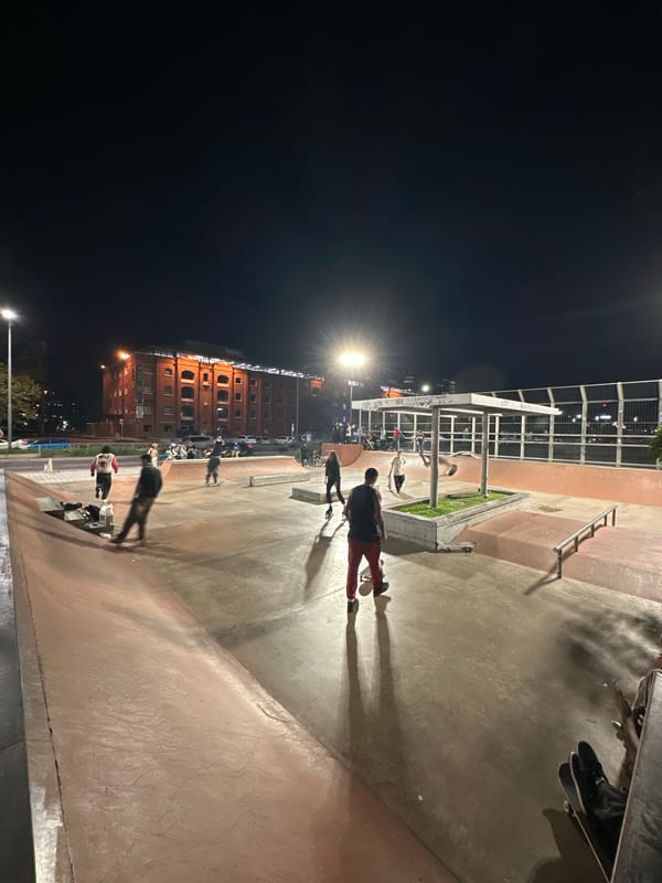 Night skateboarding session observed at Buenos Aires skate park