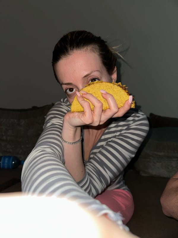 Person enjoys taco dinner in Amsterdam apartment
