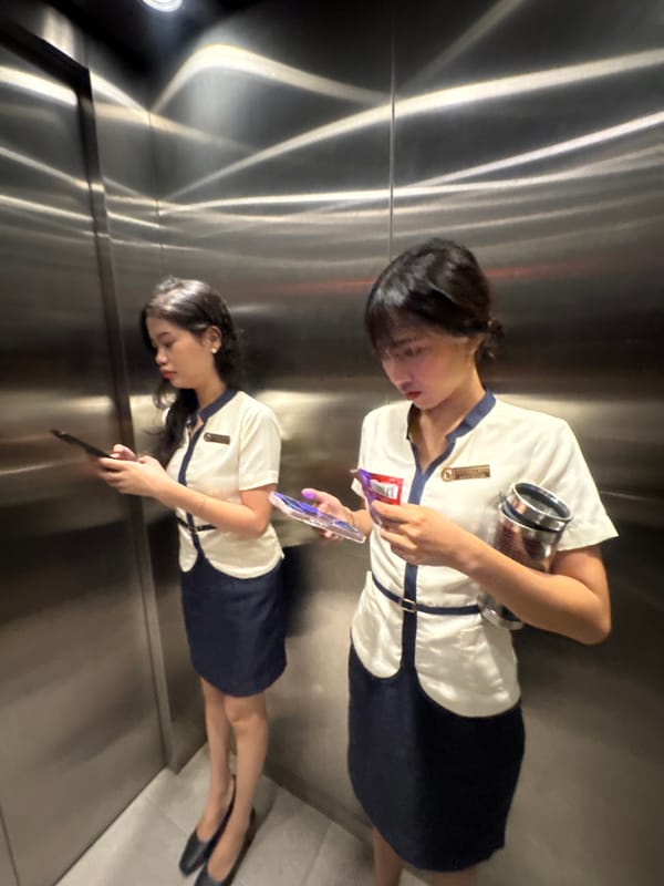 University staff in Davao City snap selfies during a shift