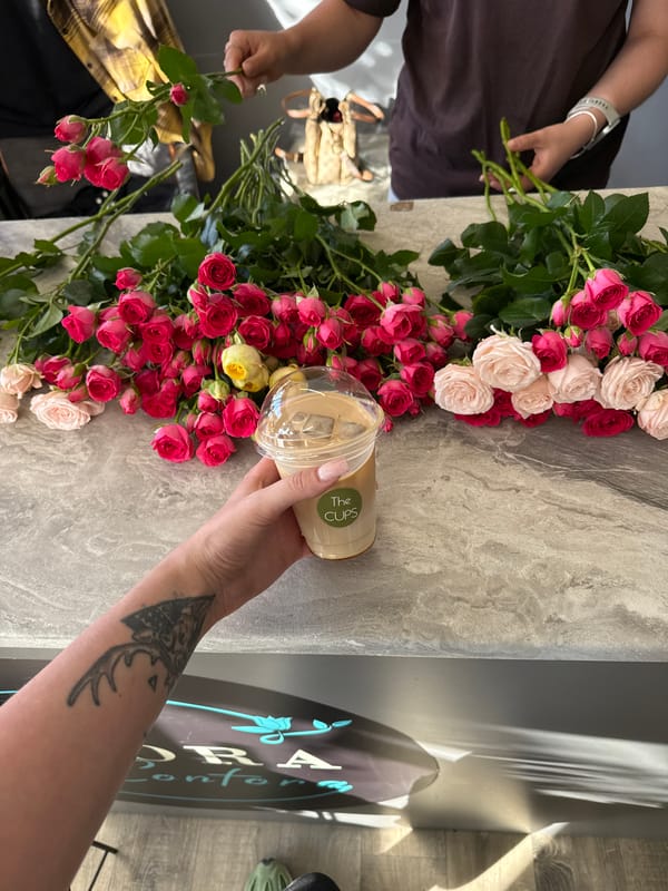 Flower shop visit with bouquets, ribbons, and iced coffee