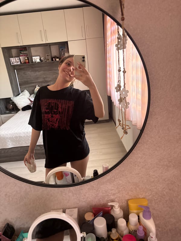 Woman photographs casual moments in Bulgarian bedroom